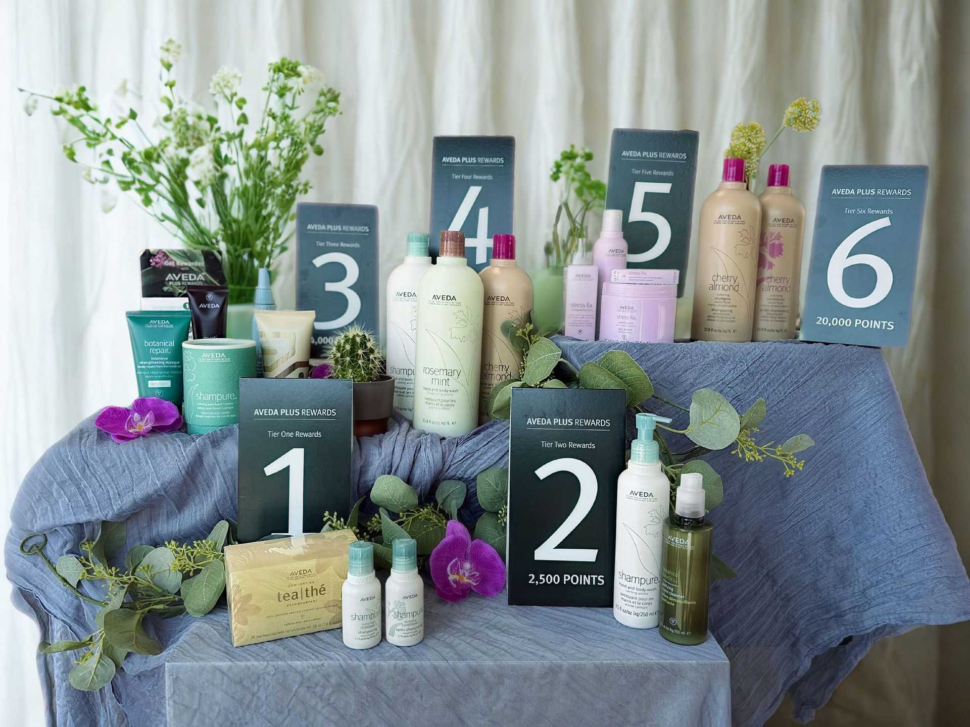 aveda products with greenery